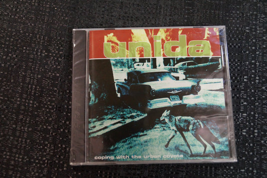 Unida "Coping with the Urban Coyote" 1999 CD Art By Kozik
